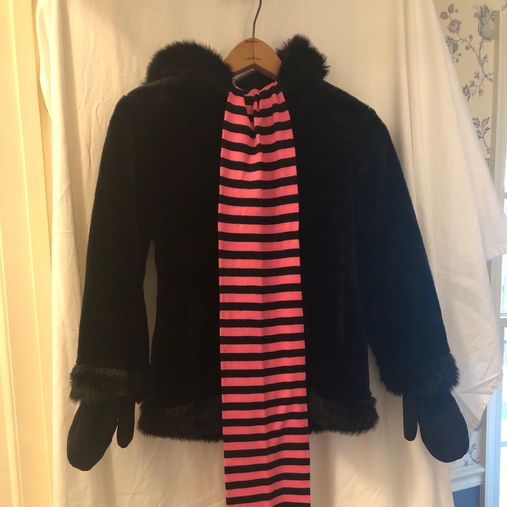 Black faux fur coat with striped scarf and mittens